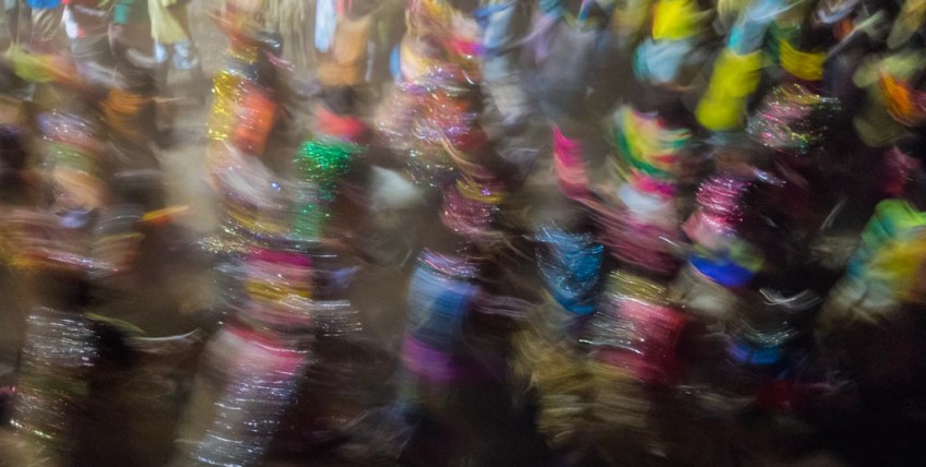 A blur of tinsel-clad dancers