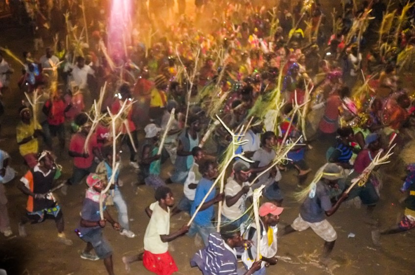 Men's dance: charging with sticks